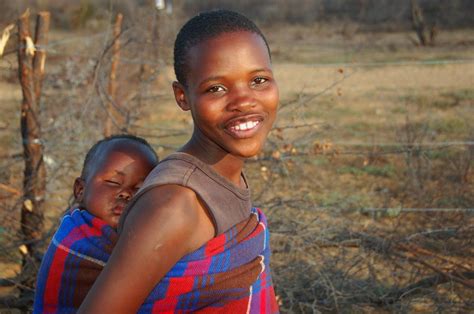 To the dominance of setswana as national language by speakers of other languages in the. Botswana People and Culture | Girl and child in a small ...