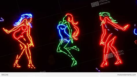 Dancing Girls Neon Sign Stock Video Footage 885246