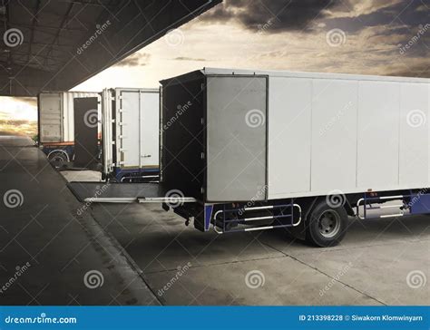 Cargo Container Truck Parked Loading At Dock Warehouse Cargo Shipment