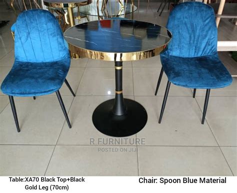 spoon blue leather chair and gold leg dining table in kaneshie furniture r furniture jiji