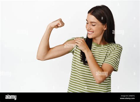 Woman Flexing Her Bicep Hi Res Stock Photography And Images Alamy