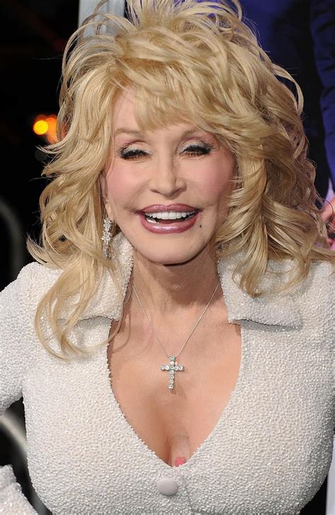 Dolly Parton's tattoos: Why singer always covers her arms ...