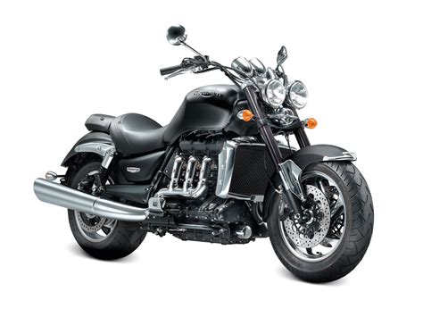 Con especificaciones optimizadas para carretera y circuito, el inédito modelo irrumpe como la nueva tope de gama de la familia roadsters. Motorcycle Pictures: Triumph Rocket III Roadster 2011