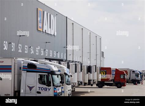 ALDI distribution centre delivery bays with HGV trucks in Bolton
