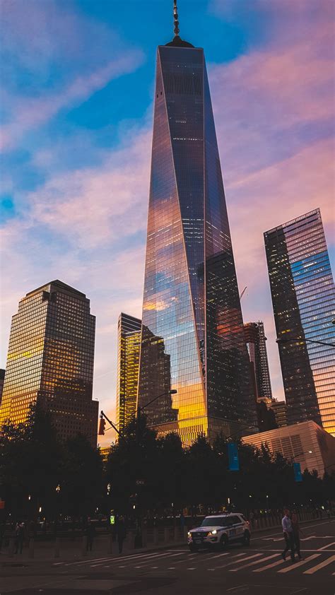 A tall modern building with many floors: High-rise Building · Free Stock Photo