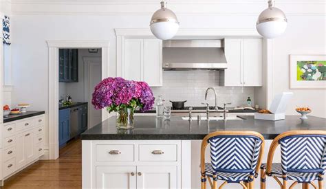 This white wall mounted cabinet has a simple shaker style design. 15 Kitchens With Shaker-Style Cabinets