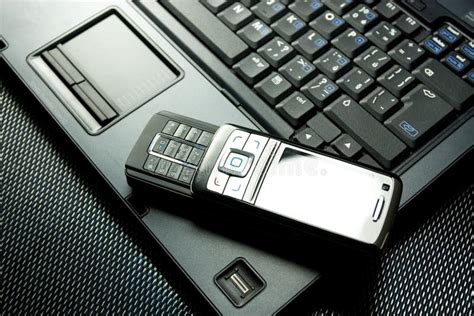 Mobile Phone On A Laptop Stock Image Image Of Phone Gray 5066537