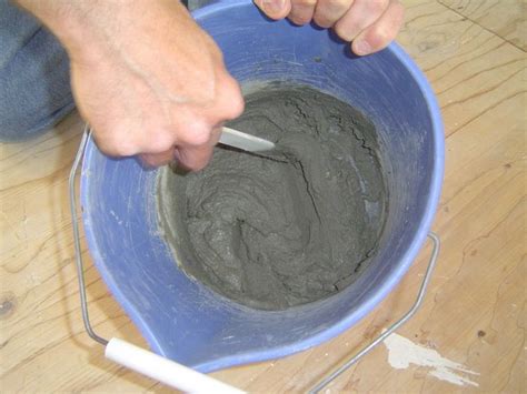 You can easily mix grout by hand in a small bucket, but you can also use a power drill attachment to make it faster and more. Applying Grout to Ceramic Tile Floor