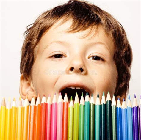 Little Cute Boy With Color Pencils Close Up Smiling Education Face