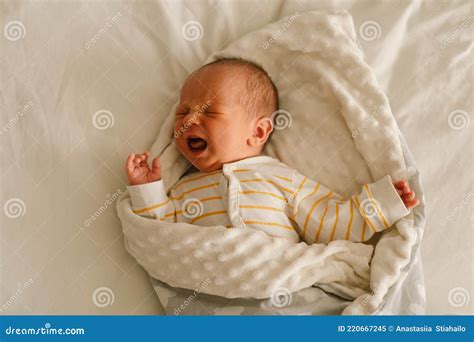 Cute Emotional Newborn Little Baby Boy Cry In Crib Stock Image Image
