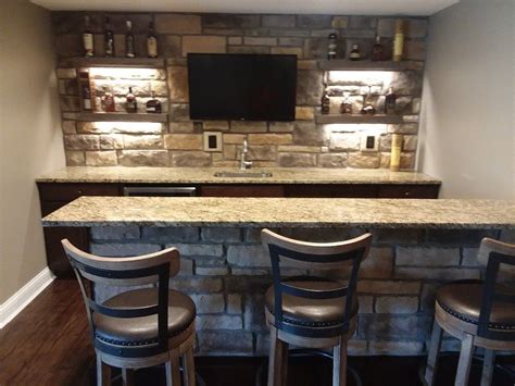 Maybe you would like to learn more about one of these? Custom Stone Bar. This basement bar has a Smokey or ...
