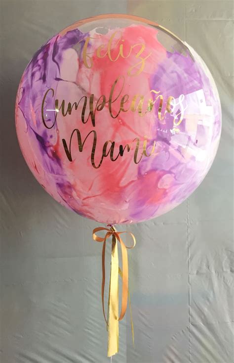A Large Balloon With Writing On It
