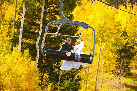 Bride And Groom On The Ski Lift In The Mountains Mountain View Photo