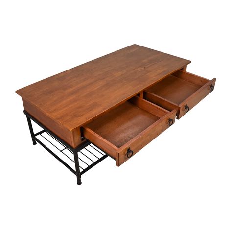 It has open shelf on the base for storing books. 53% OFF - Rustic Wood Coffee Table with 2 Drawers and ...