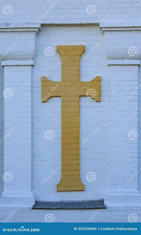 Yellow Orthodox Cross On The Brick Wall Of The Church Brick Texture