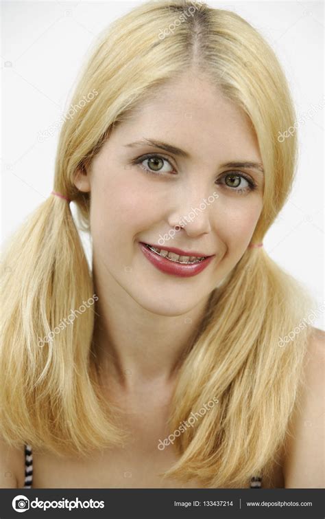 Young Woman With Braces And Pigtails — Stock Photo © Microstockasia