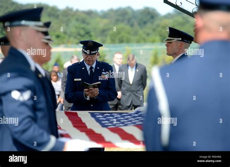 An Air Force chaplain reads a passage in honor of ninth Chief Master