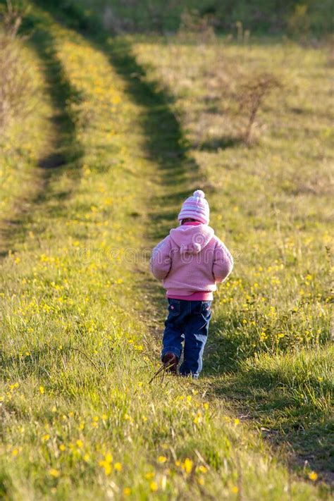 Little Girl Walks In The Spring Park Stock Image Image Of Field