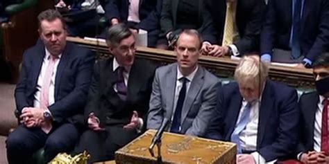 jacob rees mogg whispers to boris johnson moments before he delivers jimmy savile slur indy100