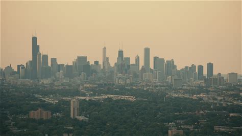 Hd Stock Footage Aerial Video Of The Hazy Skyline At Sunset In Downtown