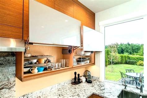 An even more affordable choice, however, would be to simply refinish the existing doors. Image result for lift up kitchen cabinet doors | Kitchen ...