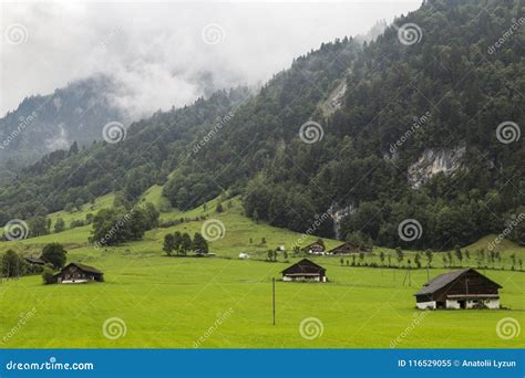 Alpine Village In The Fog Swiss Alps Switzerland Stock Image