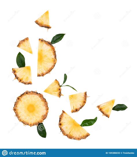 Sliced Pineapple With Green Leaves Isolated On White Background Pieces