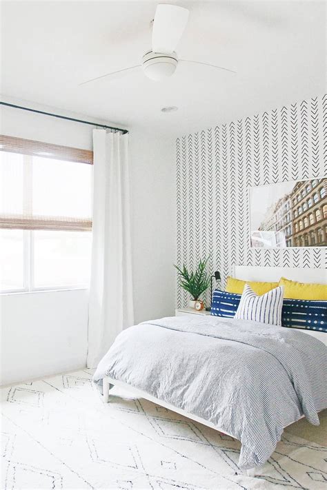 A traditional gold chandelier hangs from the ceiling and complements the. Bright White Boy's Bedroom Interior Inspo - Livettes