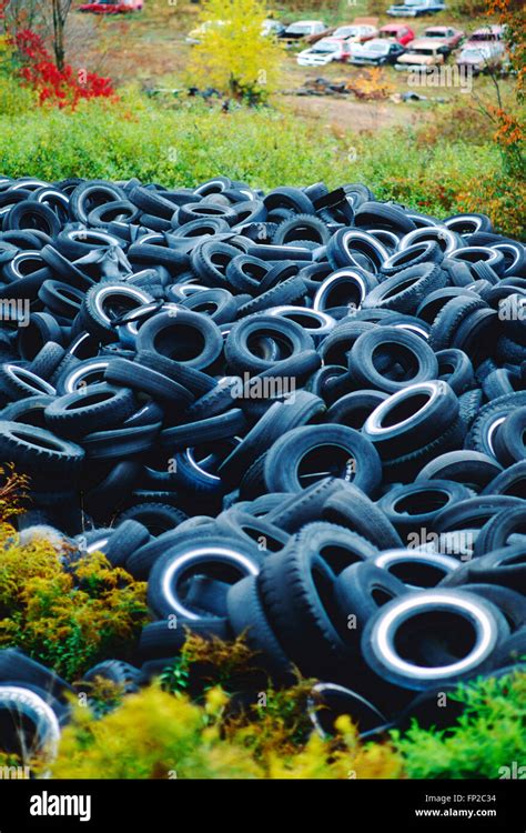 Old Used Automobile Tires In Landfill Stock Photo Alamy