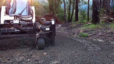 Landscape Australia Nsw Using A Harley Rake To Clean Up Gravel