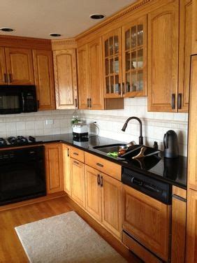 Paint a kitchen cabinet, door or small project. Black Granite with White Tile Backsplash | Kitchen tile ...