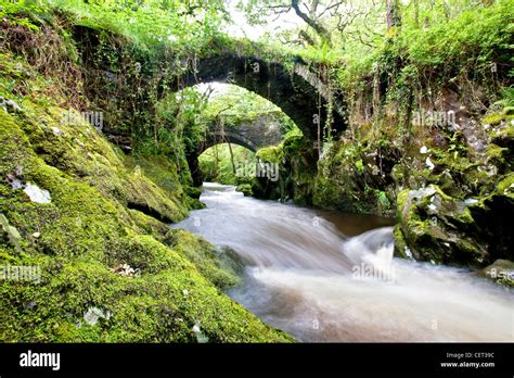The Roman Bridge Over The River Machno At Penmachno Near Betws Y Coed In Snowdonia National Park