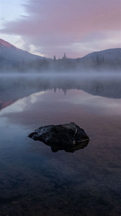 Download Wallpaper 1080x1920 Lake Stone Fog Mountains Reflection