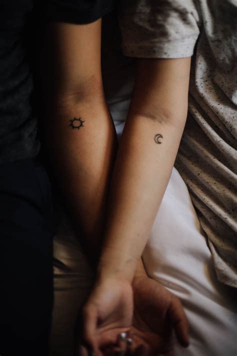 Two Persons Showing Their Hand Tattoos Photo Free Love Image On Unsplash