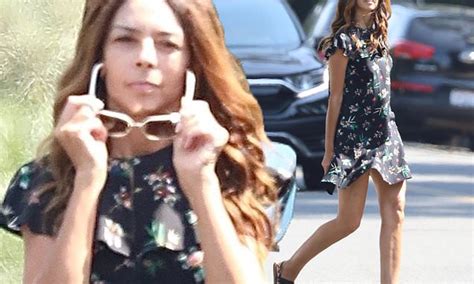 Terri Seymour Puts On A Leggy Display In A Thigh Skimming Floral Dress