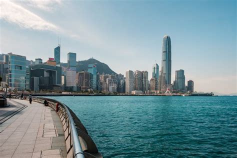 Waterfront Promenade With Victoria Harbour And Skyline Of Hong Kong