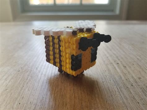 In celebration of the new 1.15 snapshot, I made a bee using perler/fuse