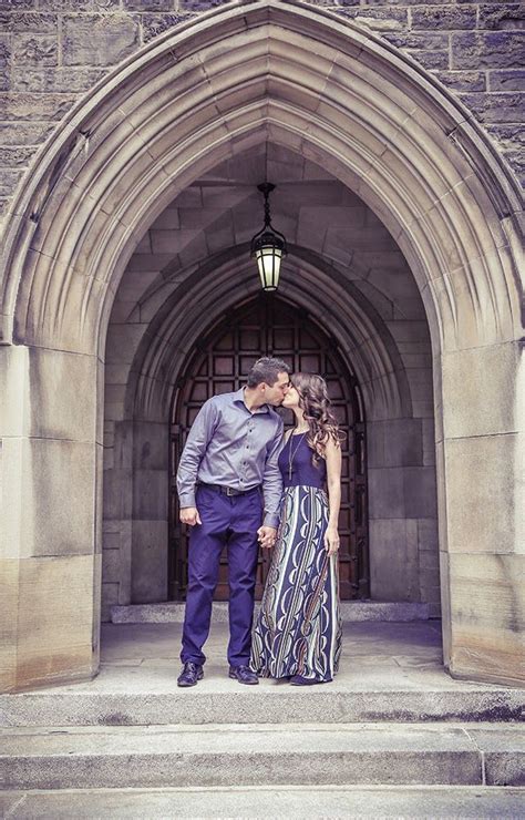 Couple Kissing In Archway At University Of Toronto Vintage Engagement