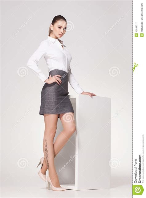 Beautiful Woman With Long Sexy Legs Dressed Elegant Posing