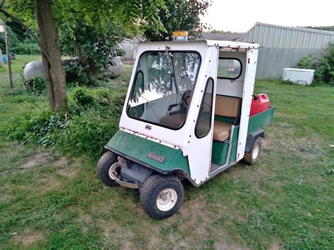 Ezgo gas golf cart with enclosed cab - Golf Carts - New Palestine