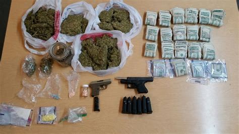 drugs guns money seized in arrest