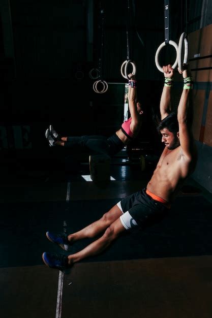 Premium Photo Couple Doing Gymnastics On Rings