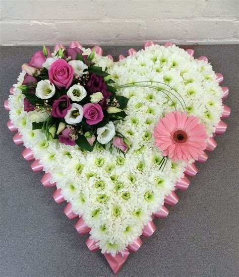 Maybe you would like to learn more about one of these? Pink Based Funeral Heart wreaths undertaker or crematorium ...