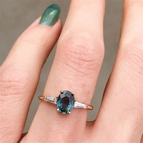 Teal Oval Sapphire Tapered Baguette Engagement Ring In 2020
