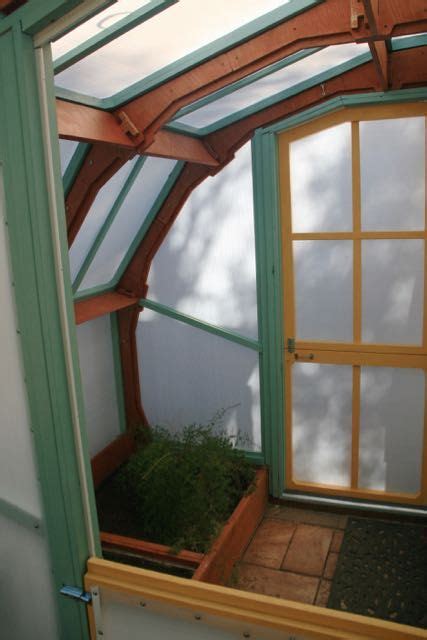 Your friend greg shows you how to grow with hydroponic systems in a solexx greenhouse. Inside view of entry arch showing bed, Solexx glazing, CNC ...