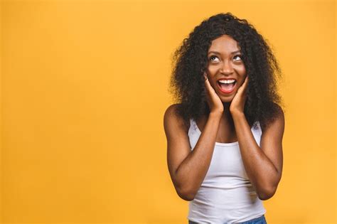 Premium Photo Surprised And Shocked Happy Young African American Woman