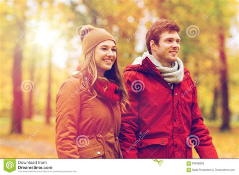 Happy Young Couple Walking In Autumn Park Stock Image Image Of Love