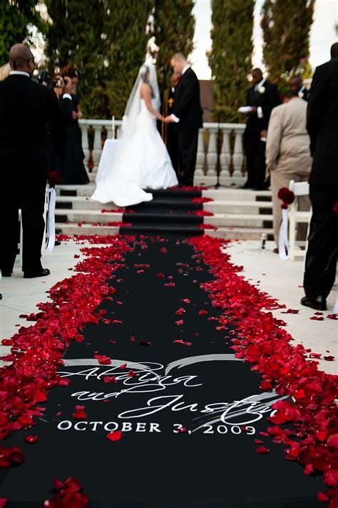 If you want to shout your holiday spirit from the rooftop, then get ready to impress family and friends with these 42 memorable red christmas decoration ideas. Black and Red Wedding Aisle Runner - shared in a roundup ...