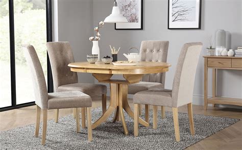 Have a dining room in your home which spells luxury. Hudson Round Oak Extending Dining Table with 4 Regent ...