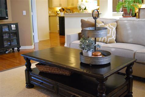 A storage coffee table can keep blankets and board games within easy reach without cluttering your space. Momfessionals: Come On In - New Family Room and Eating Area